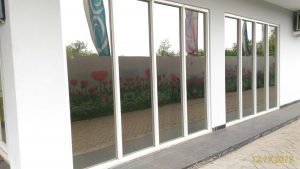 harga kaca film one way