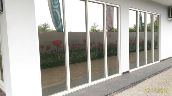 harga kaca film one way