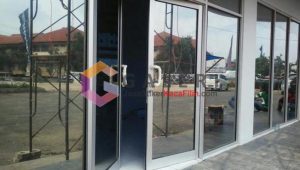 harga kaca film gedung